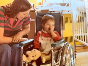 Young Mariah Forster Olson with Mom in Wheelchair