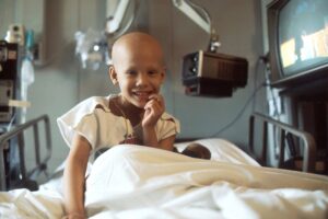 Girl with Cancer in Hospital Bed