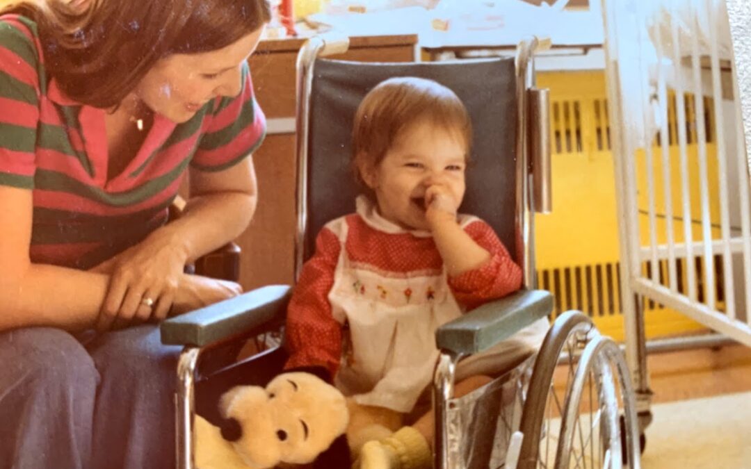 Mom and I in wheelchair – June 6, 1980[1]