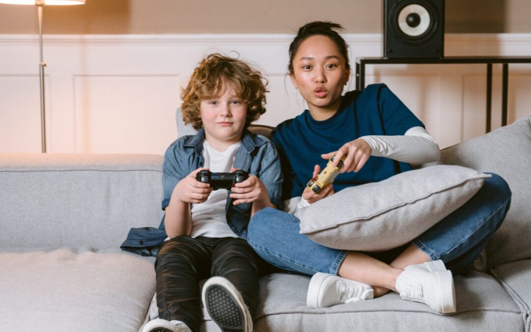 babysitter and kid playing video games